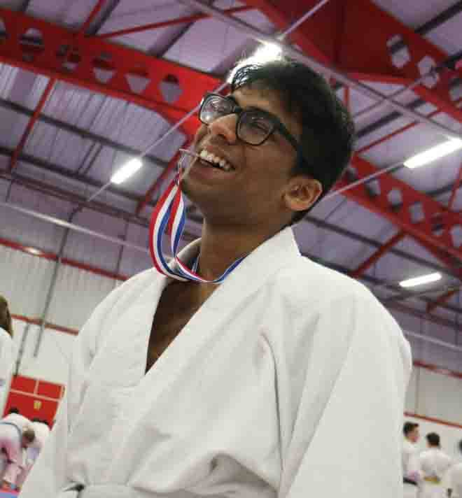 Vishal with a Jiu Jitsu medal